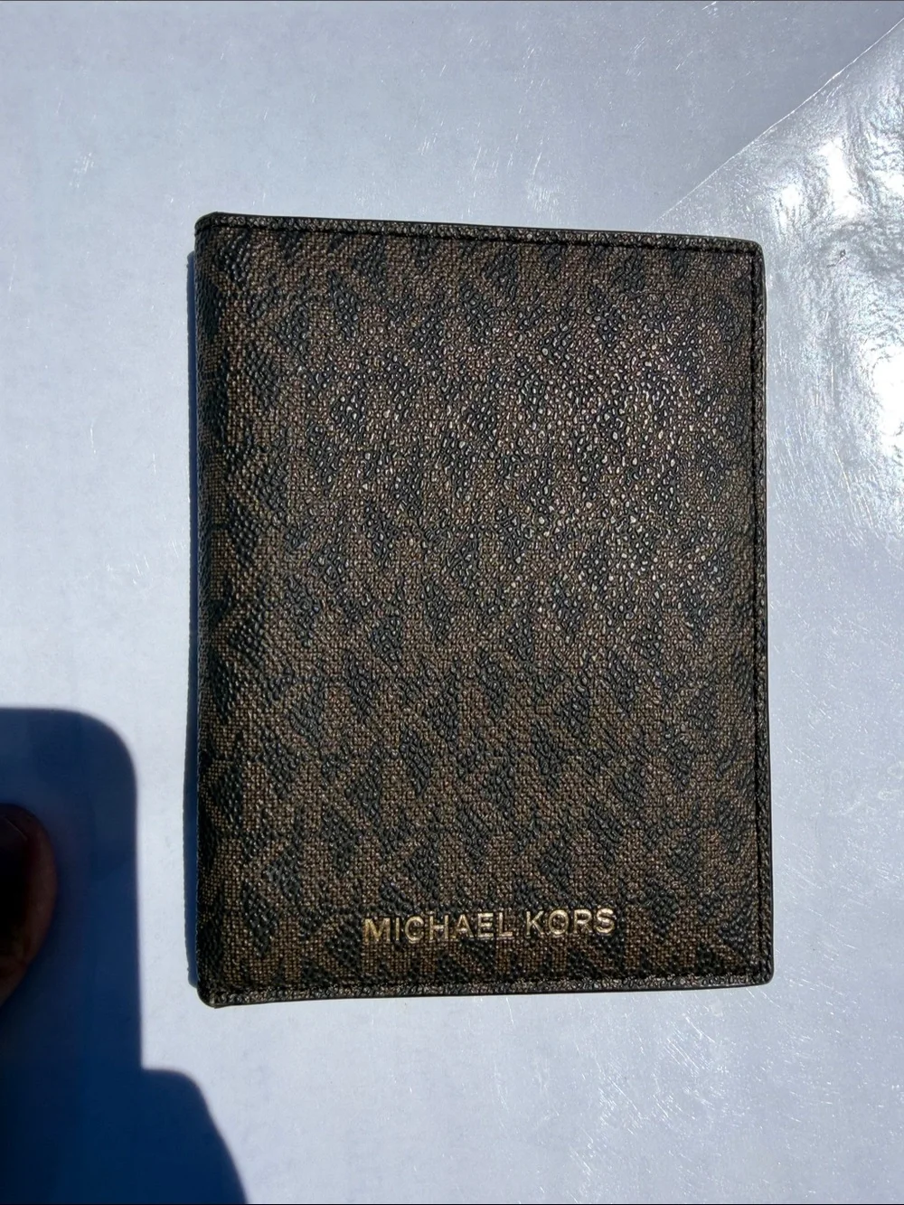 Michael Kors Brown Monogram Passport Cover with Gold Logo